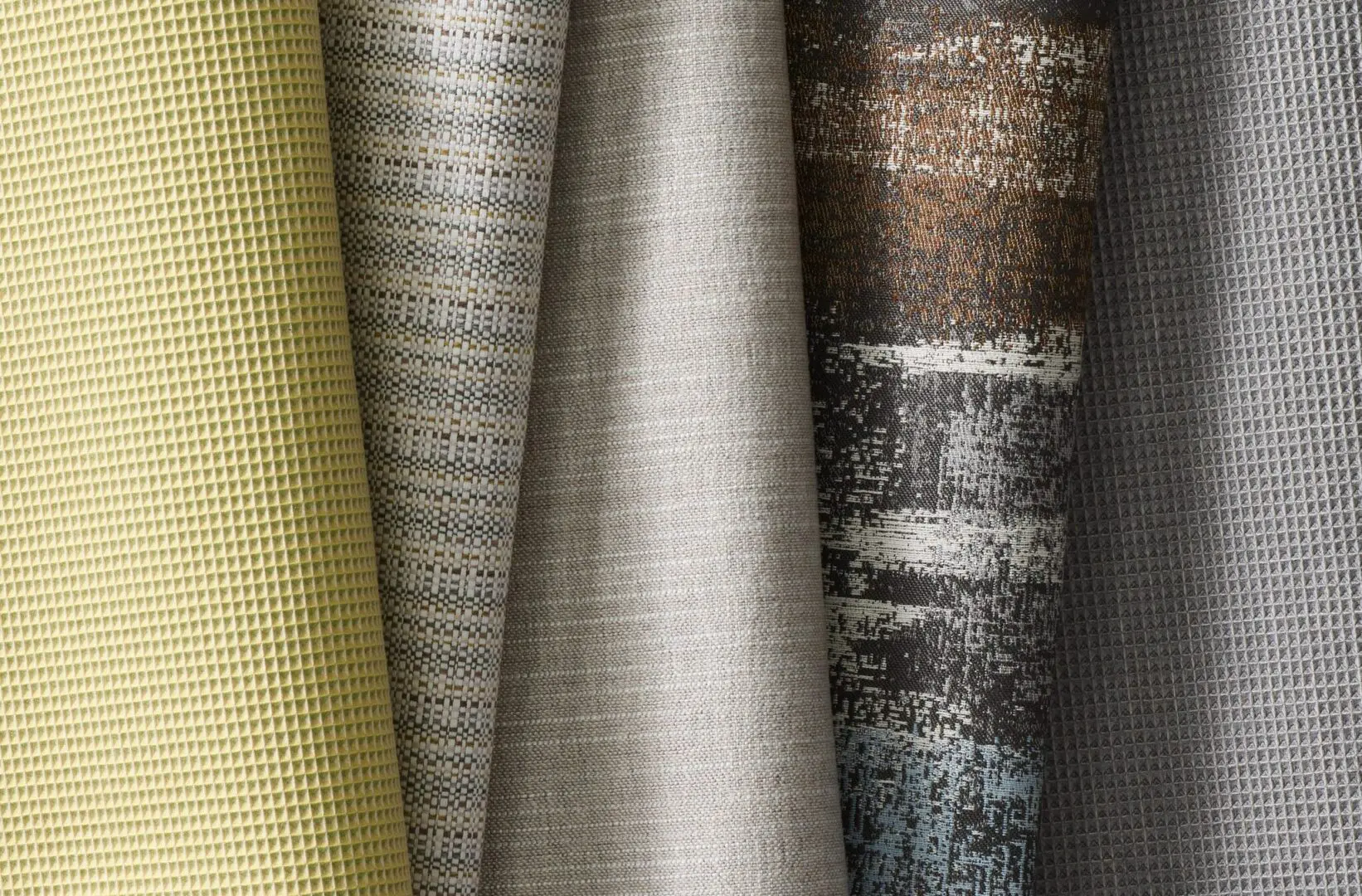 A close up of several different types of fabric