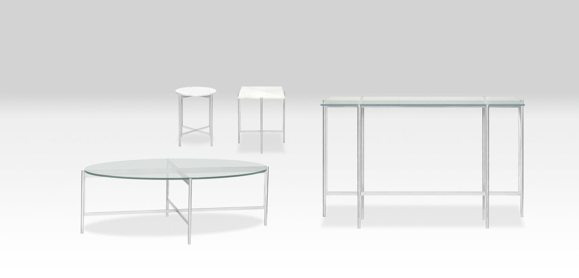 A white table and some tables in the middle of a room.