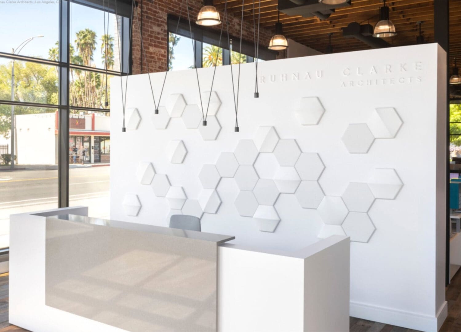 A white wall with a large hexagonal pattern.